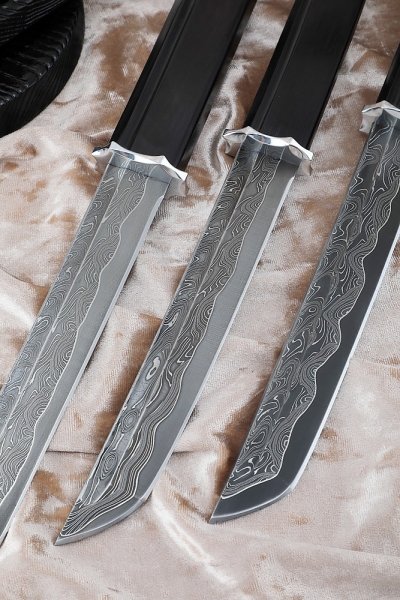 A set of knives Tanto Damascus laminated black hornbeam on a stand 