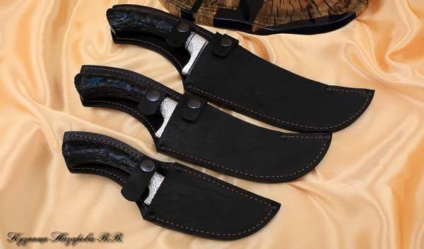 A set of Uzbek knives 95h18 black hornbeam on a stand