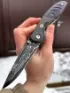Нож складной Аист дамаск ламинированный накладки карельская береза фиолетовая карбон