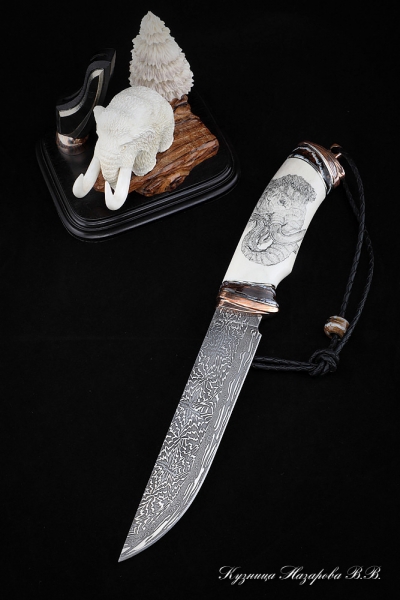 Author's composition The Age of the mammoth knife damascus end handle mokume-gane, mammoth tooth, walrus tusk with a pattern