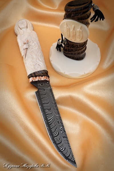 Knife Chief Damascus end mokume-gane moose horn carved on a stand