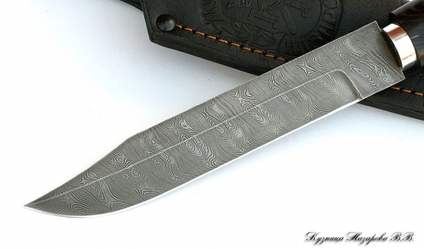 The knife of the Fink Sapper Damascus black hornbeam