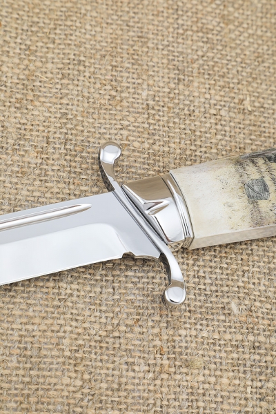 WWII cannonball knife, elk horn handle with scrimshaw and molded scabbard