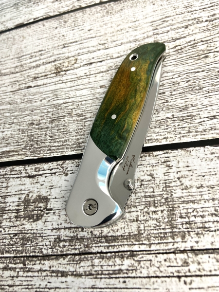 Нож складной Корвет сталь Х12МФ рукоять стабилизированная карельская береза зеленая дюраль