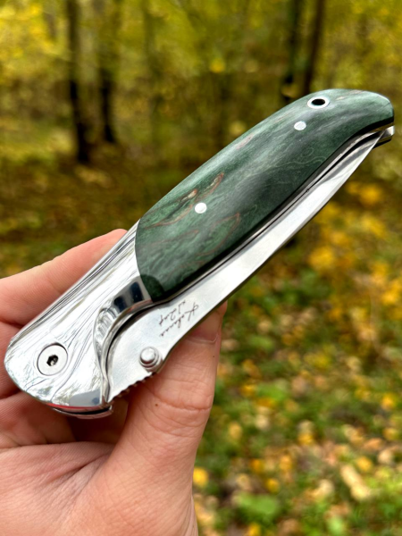 Folding knife Corvette steel X12MF handle stabilized Karelian birch green duralumin