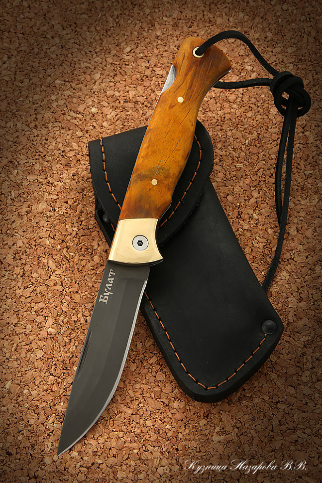 Folding knife Wolf steel wootz steel lining stabilized Karelian birch amber