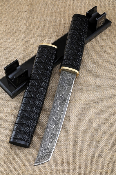 Knife Samura Damascus Laminated Black hornbeam Carved Wooden sheath on a stand