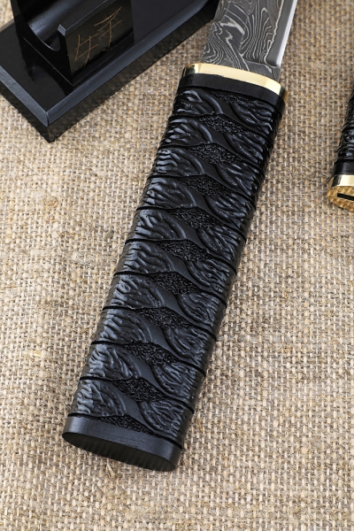 Knife Samura Damascus Laminated Black hornbeam Carved Wooden sheath on a stand