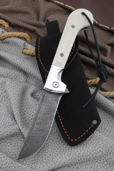 Folding knife on a bearing Pchak steel damascus, lining acrylic white (NEW)