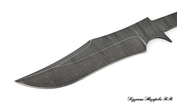 The blade is the Puma Damascus