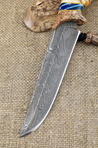 Sapper Damascus knife end bone of mammoth maple cap on a stand