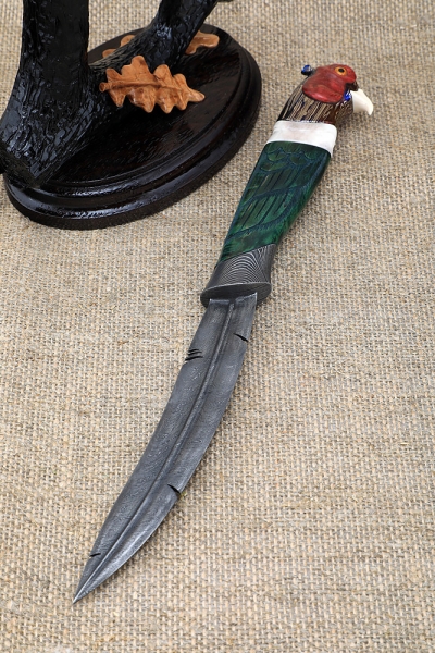 Knife Capercaillie Damascus handle carved Karelian birch blue with acrylic on a stand