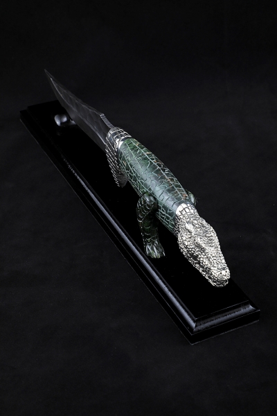 Knife Crocodile Damascus stone handle Karelian birch carved green nickel silver on a stand