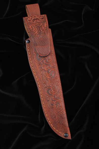 The knife Irbis Damascus laminated with a dole of iron wood